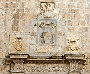 Bas-reliefs of stone with Latin inscription photo