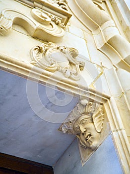 Bas-relieves in a baroque facade. Italian style photo