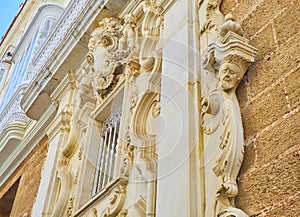 Bas-relieves in a baroque facade. Italian style photo