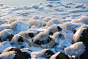 Ice coverde basalt blocks in winter 2020-2021. photo