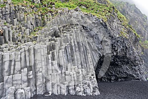 basalt columns and hexagonal pillars near Svartifoss waterfall in Iceland