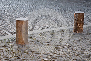 Basalt hexagonal natural column created by the gradual solidification of lava, is used in the city as a safety dividing bollard on photo