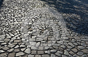 Basalt hexagonal natural column created by the gradual solidification of lava, is used in the city as a safety dividing bollard on photo