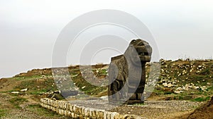 Basalt lion statue, Ruins Ain Dara temple near Aleppo Syria photo