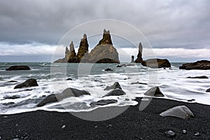 Basalt rock formations Troll toes on black beach