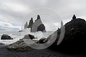 Basalt rock formations Troll toes on black beach. Reynisdrangar, Vik, Icelan