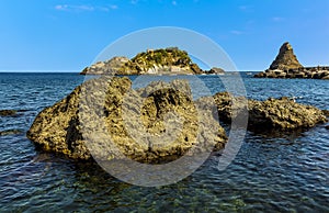 Basalt rocks of  Isole dei Ciclopi at Aci Trezza, Sicily