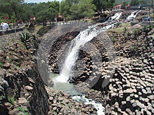 Basaltic prisms and waterfall of Santa MarÃÂ­a Regla, Mexico. photo