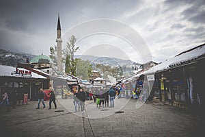 Bascarsija square with Sebilj wooden fountain in Old Town Sarajevo, capital city of Bosnia and Herzegovina