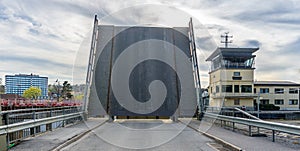 A bascule bridge during raised both parts over the lake chanel