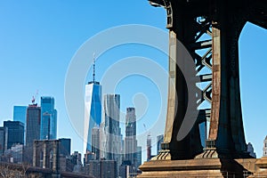 Base of the Manhattan Bridge along the East River with the Lower Manhattan Skyline in New York City