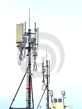 Base station, cell site, pole or mobile phone base station with antenna on the deck for wireless communications