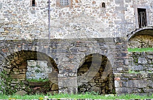 Base with two niches of a large and historic stone house in San Romano in Garfagnana.