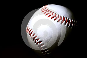 Baseball against dark background