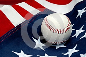 A baseball on the American flag