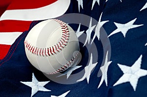 A baseball on the American flag