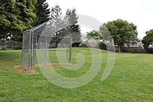 Baseball backstop in field