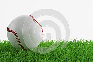 Baseball ball on green grass