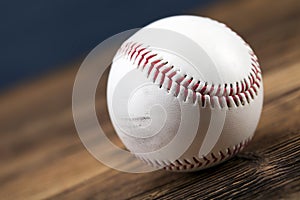 Baseball ball on wooden table