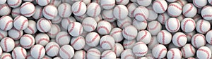 Baseball balls background with red stitching lying in a pile