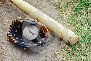 A baseball bat concept with ball outdoors in the park on the field