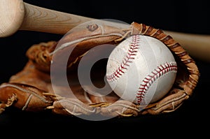 Baseball and Bat and Glove on black