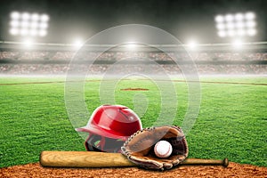 Baseball Bat, Helmet, Glove and Ball on Field in Outdoor Stadium With Copy Space