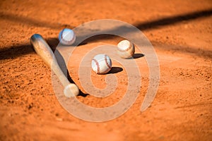 Baseball and Bat on Home Plate