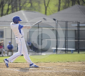 Baseball batter swinging at a pitch