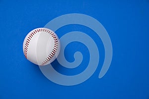 Baseball on blue table background