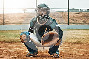 Baseball, catcher and sports with man on field at pitchers plate for games, fitness and health in stadium park. Helmet