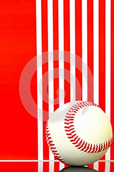 Baseball close up against striped abstract background