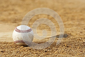 Baseball in dirt