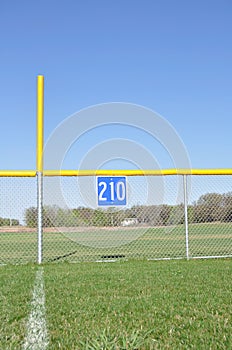 Baseball Foul Pole and Outfield Fence photo