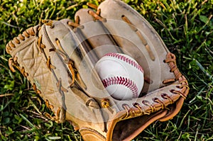 Baseball game mitt and ball