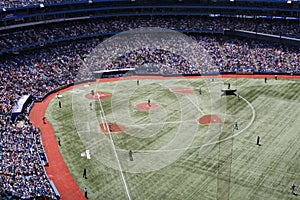 Baseball game in progress on a big stadium