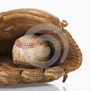 Baseball in glove.