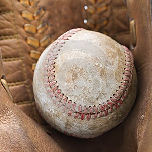 Baseball in glove.