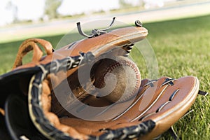 Baseball Glove And Ball On Field