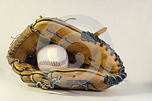 baseball glove with baseball