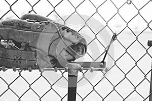 Baseball glove in dugout close up