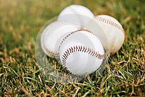 Baseball, grass and ball on baseball field for sport training, fitness and team sports outdoor. Softball, balls and