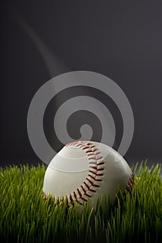 Baseball on green grass