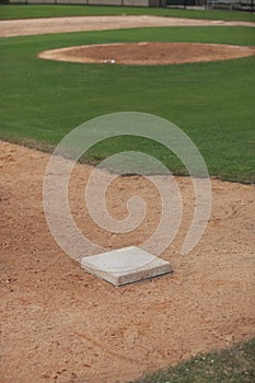 Baseball infield showing third base and pitcher`s mound