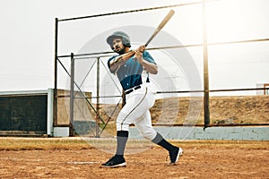 Baseball man, stadium game or hit ball with bat on a sport field in a game. Sports player with practice, strike and