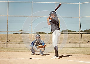 Baseball, pitcher and man with a bat on pitch playing a match or sport training as a team. Fitness, sports and men