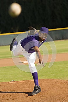 Baseball Pitcher Throwing Ball