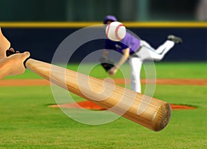 Baseball Pitcher Throwing Ball to Batter photo