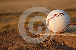 Baseball on Pitchers Mound Rubber