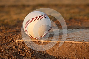 Baseball on Pitchers Mound Rubber